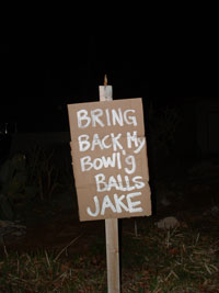 Please return bowling ball sign